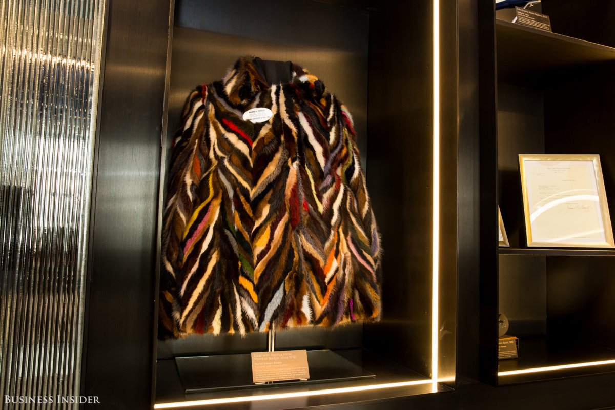 An event space dedicated to Muriel Siebert, the first woman to hold a NYSE seat, holds the colorful coat she would often wear out on the trading floor.