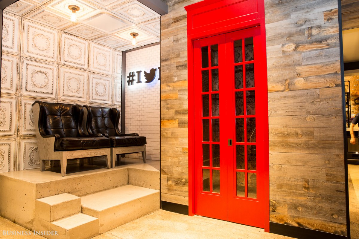 There are also a bright red phone booths for private phone calls and some comfy seats for anyone looking to chill down here.