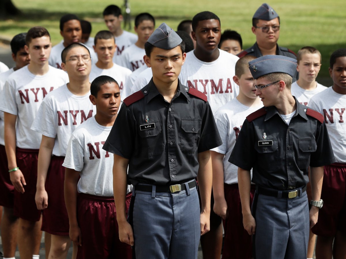 Cadets wear uniforms, learn drills, and sleep in "barracks."