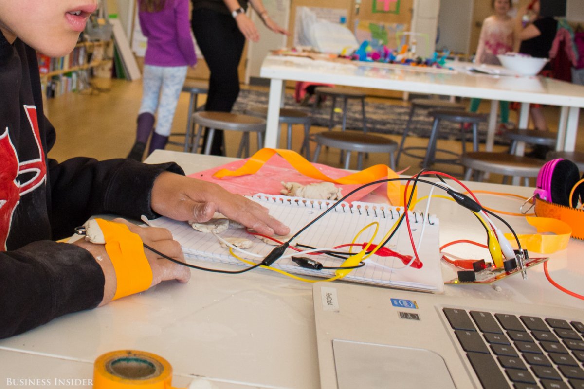 He attached alligator clips to mounds of clay and taped one clip to himself. When he tapped the clay and completed the circuit, the computer interpreted the input as arrow key actions.