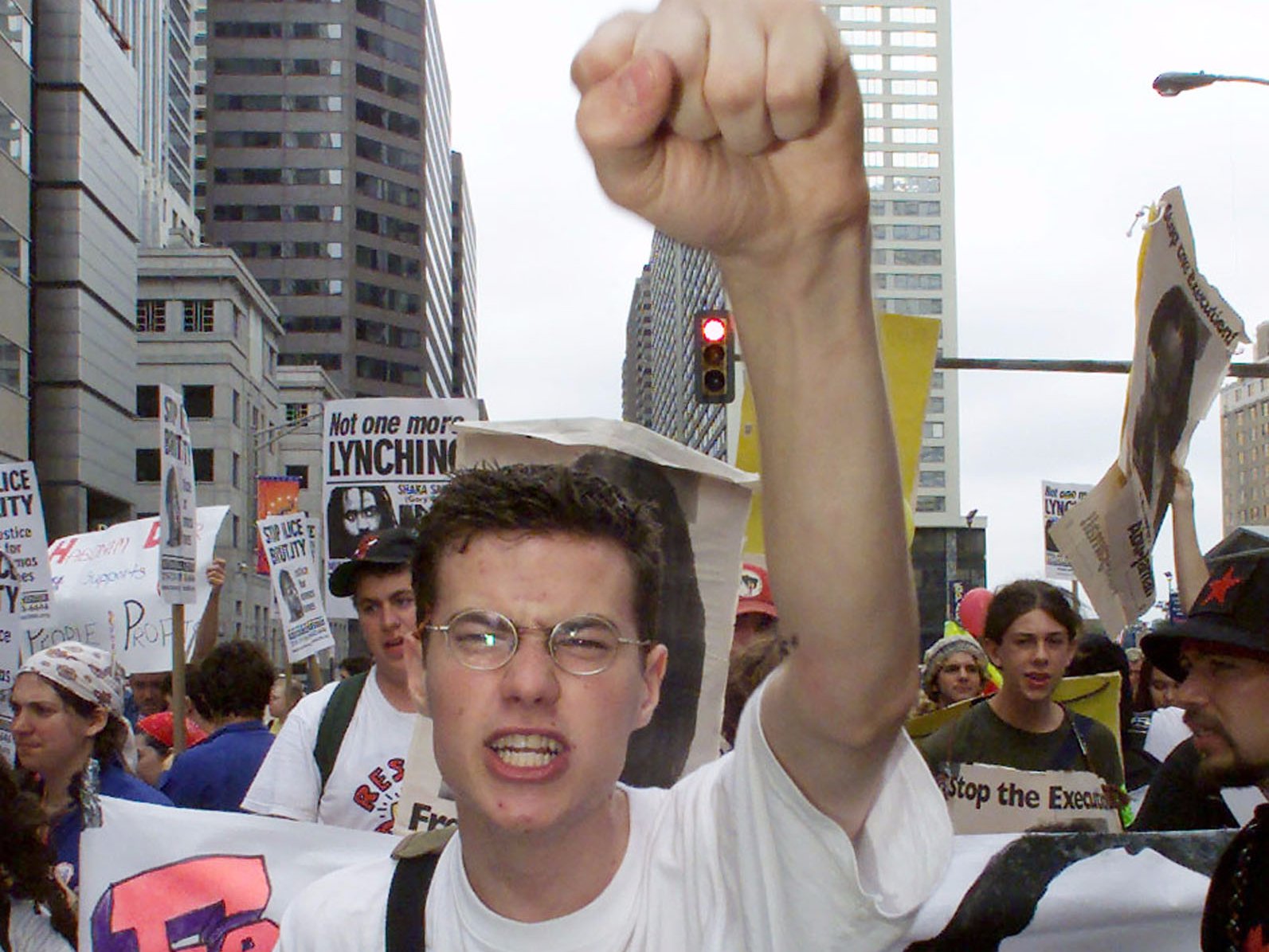 A protestor in support of jailed African-American activist Mumia Abu-Jamal screams and thrusts his fist in the air July 30, 2000 as he marches through downtown Philadelphia during the Unity 2000 March. Demonstrators from more than 100 groups gathered in anticipation of the start of the Republican National Convention in Philadelphia on July 31.