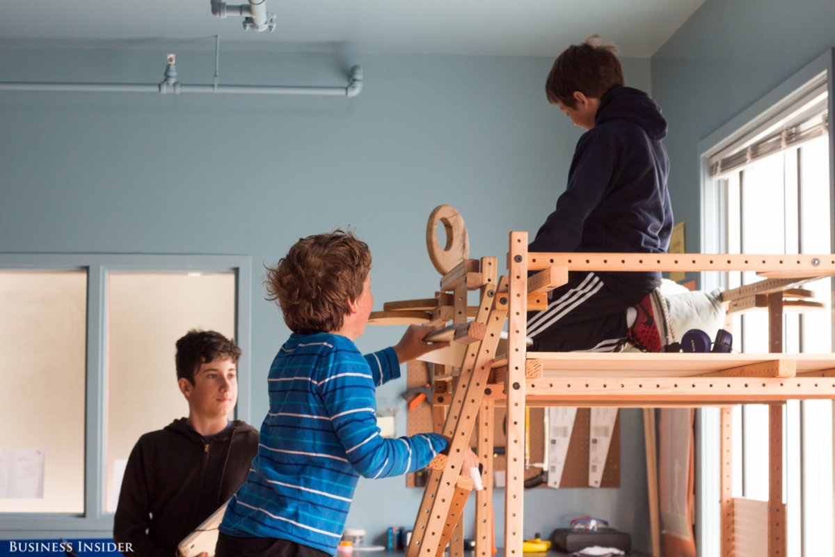 The classroom, like the tech, fosters AltSchool's individualized learning approach. Students sprawl across the room on carpets, beanbags, and even lofts of their own construction.