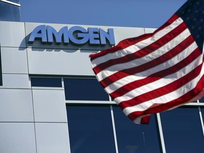 An Amgen sign is seen at the company's office in South San Francisco, California in this October 21, 2013 file photo.  REUTERS/Robert Galbraith/Files 